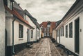 A small cobblestone street in Denmarks oldest city Ribe Royalty Free Stock Photo