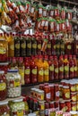 Jars with variety of peppers in municipal market of Ribeirao Preto. Preserved food background