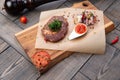 Ribeye steak on the board. On a wooden background Royalty Free Stock Photo