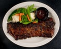 Ribs with steamed vegetables