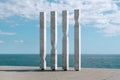 Ricardo Bofill sculpture representing the four bars of the catalan flag.