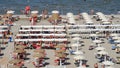 Riccione, Italy. Aerial view of colorful beach umbrellas, gazebos and sun beds. Summer holidays at the sea Royalty Free Stock Photo