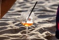 Riccione , Italy - May 1, 2018: A bottle of Martini champagne, sea beach on the background.Three refreshing summer