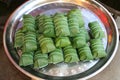 Rice in banana leaves on a tray, Asia