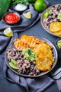 Rice with black beans, fried chicken breast and tostones, plantains Royalty Free Stock Photo