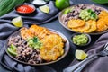 Rice with black beans, fried chicken breast and tostones, plantains Royalty Free Stock Photo