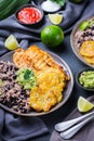 Rice with black beans, fried chicken breast and tostones, plantains Royalty Free Stock Photo