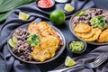 Rice with black beans, fried chicken breast and tostones, plantains Royalty Free Stock Photo