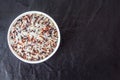 Rice in a bowl on black background Royalty Free Stock Photo