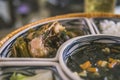 rice bowl with rattan, inside is traditional Vietnamese lunch, rice, soup, salty food. The scene is frugal and peaceful Royalty Free Stock Photo