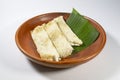 Rice cake from Bangladesh on clay dish. local name Binni chaler pathishapta pitha, goigga pitha, Puli, biroin chaler petha, binni