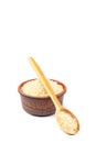 Rice in a ceramic bowl and a wooden spoon. Royalty Free Stock Photo