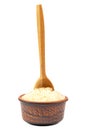 Rice in a ceramic bowl and a wooden spoon. Royalty Free Stock Photo