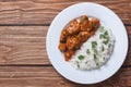 Rice with chicken in curry sauce top view Royalty Free Stock Photo
