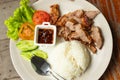 Rice, chili sauce, fish and pork fried with vegetables on a whit Royalty Free Stock Photo