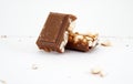 pieces of rice  chocolate bar over white background Royalty Free Stock Photo