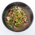 rice congee mixed with meat or rice gruel with pork, dried shrimp, dried squid and shiitake. (Thai easy breakfast) Royalty Free Stock Photo