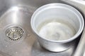 Rice cooker in sink Royalty Free Stock Photo