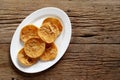 Rice cracker with flossy pork on white plate