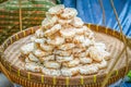 Rice crust pile arrange in weave tray Royalty Free Stock Photo