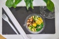 Rice with egg, avocado, cucumbers, corn in plastic packaging. Healthy breakfast Royalty Free Stock Photo