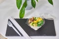 Rice with egg, avocado, cucumbers, corn in plastic packaging. Healthy breakfast Royalty Free Stock Photo