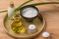 Rice flour in a wooden bowl, milk and oil with rice on the old w Royalty Free Stock Photo