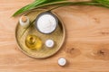 Rice flour in a wooden bowl, milk and oil with rice on the old w Royalty Free Stock Photo