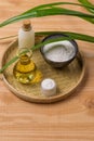 Rice flour in a wooden bowl, milk and oil with rice on the old w Royalty Free Stock Photo