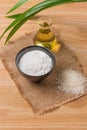 Rice flour in a wooden bowl, milk and oil with rice on the old w Royalty Free Stock Photo