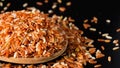 Rice grain varieties Red Jasmine Rice or Red Brown Rice. New native variety of Thailand. Vitamin B helps to treat allergies. And Royalty Free Stock Photo