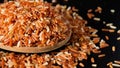 Rice grain varieties Red Jasmine Rice or Red Brown Rice. New native variety of Thailand. Vitamin B helps to treat allergies. And Royalty Free Stock Photo