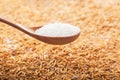 Rice grain in a wooden spoon Royalty Free Stock Photo