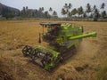 Rice harvesting machine, paddy cutter In the fields, Kanyakumari, Tamil Nadu