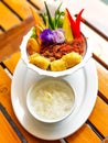 Rice in ice water on wood table Royalty Free Stock Photo