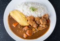 Rice with Japanese curry with omelette and chicken fried