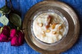 Diwali,Navratri and Durga Puja special Indian rice pudding known as rice kheer or payasam or payesh served in vintage silver plate Royalty Free Stock Photo