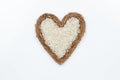 Rice lies at the heart made of burlap Royalty Free Stock Photo