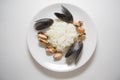 Rice with marinated mussels studio shot