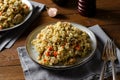 Rice with Mushrooms, Chicken, and Vegetables, Risotto, Comfort Food, Healthy Meal on Rustic Background
