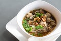 Rice noodle soup with Cooked Liver in bowl on table, selective focus