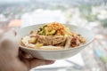 Rice noodles in fish curry sauce with chicken feet. Royalty Free Stock Photo