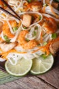 Rice noodles with shrimp and chicken, vegetables vertical Royalty Free Stock Photo