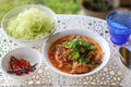 Rice noodles with spicy pork sauce