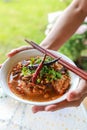 Rice noodles with spicy pork sauce