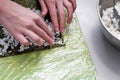 Rice on nori leaves, preparation for making sushi
