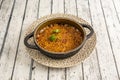 Rice paella with cuttlefish served in a black metal pan Royalty Free Stock Photo