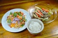 Rice porridge eat with spicy egg salad and stir fried Indian mushroom on table Royalty Free Stock Photo