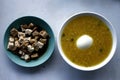 Rice porridge with hard boiled egg and sliced fried tofu