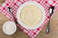 Rice porridge with milk, teaspoon, bowl with sugar, spoon Royalty Free Stock Photo